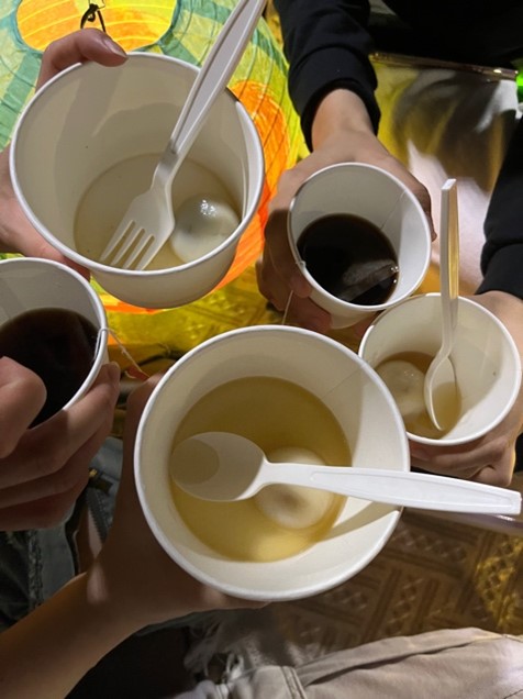 Cups of food at a festival