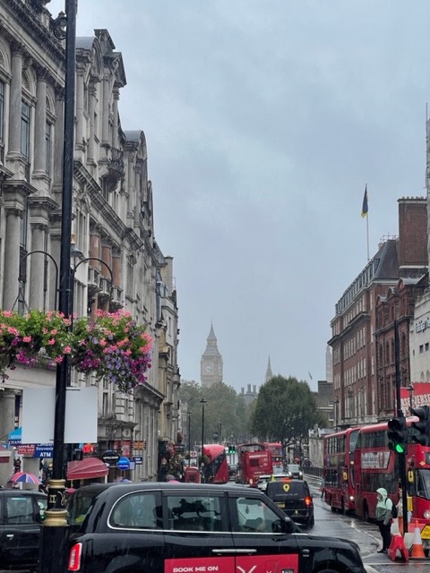 A foggy. rainy day in London with city buildings and Big Ben seen in the background