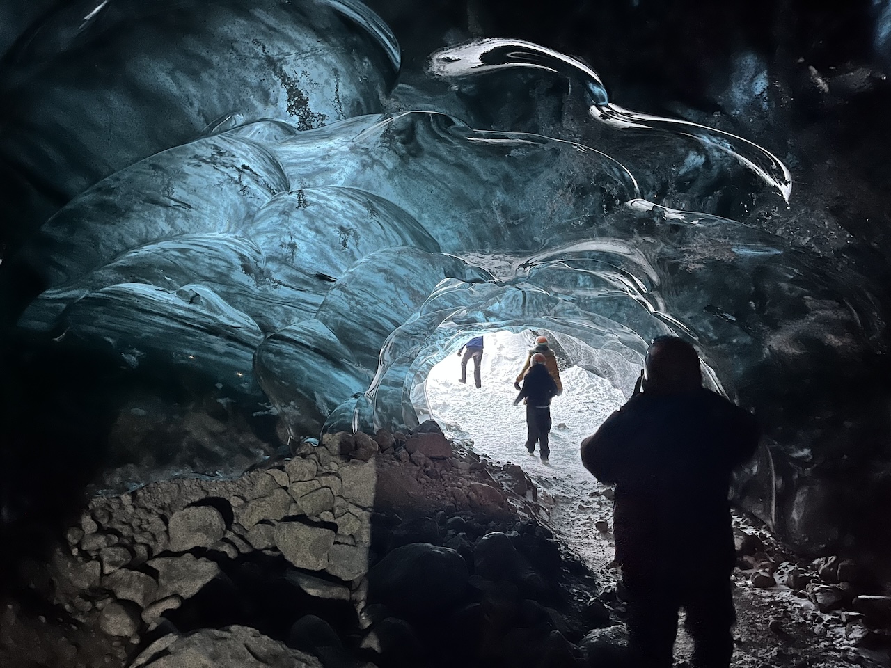 student walking through Vatnajökull National Park through glaciers