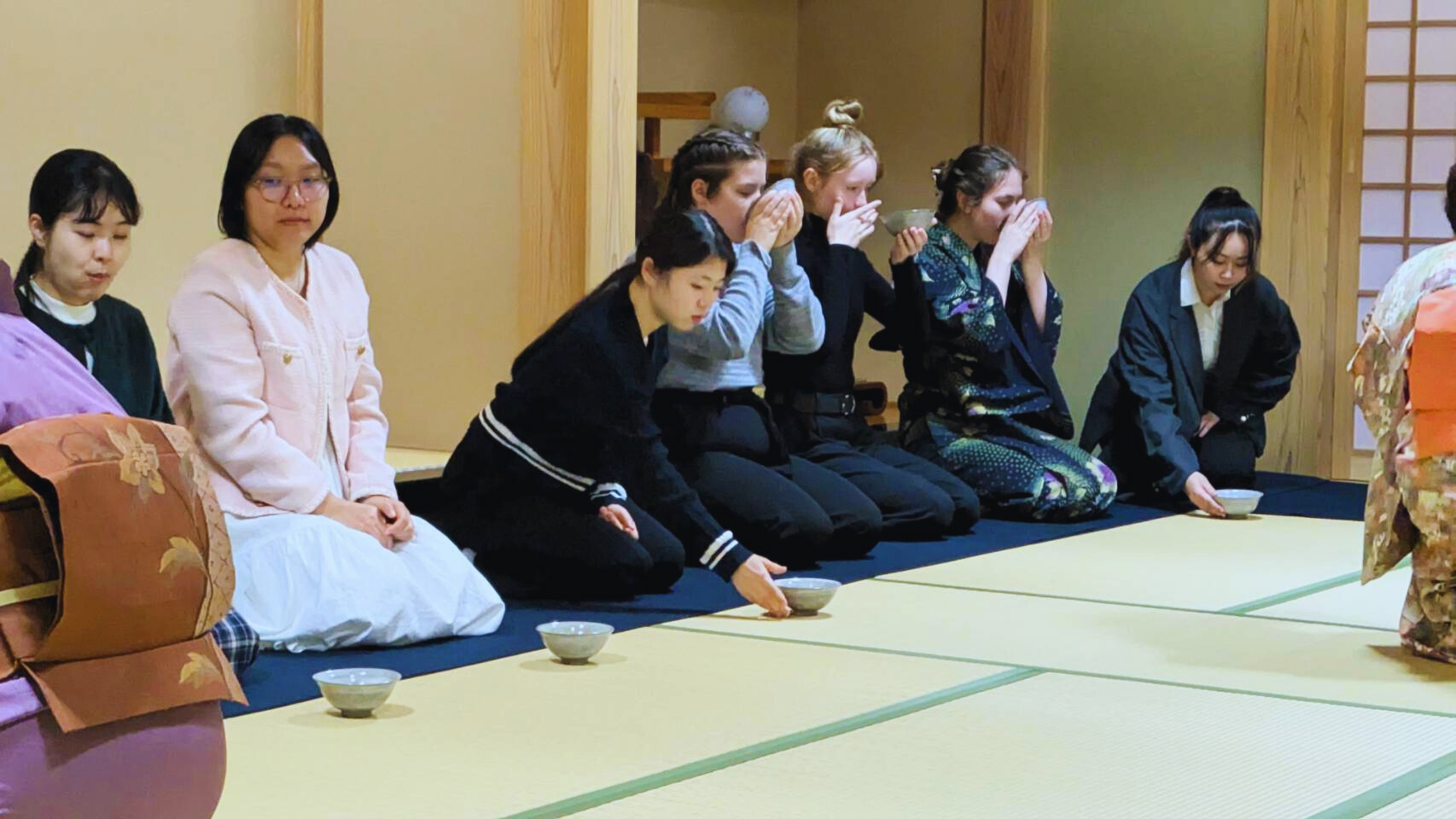 student participating in a Japanese tea ceremony