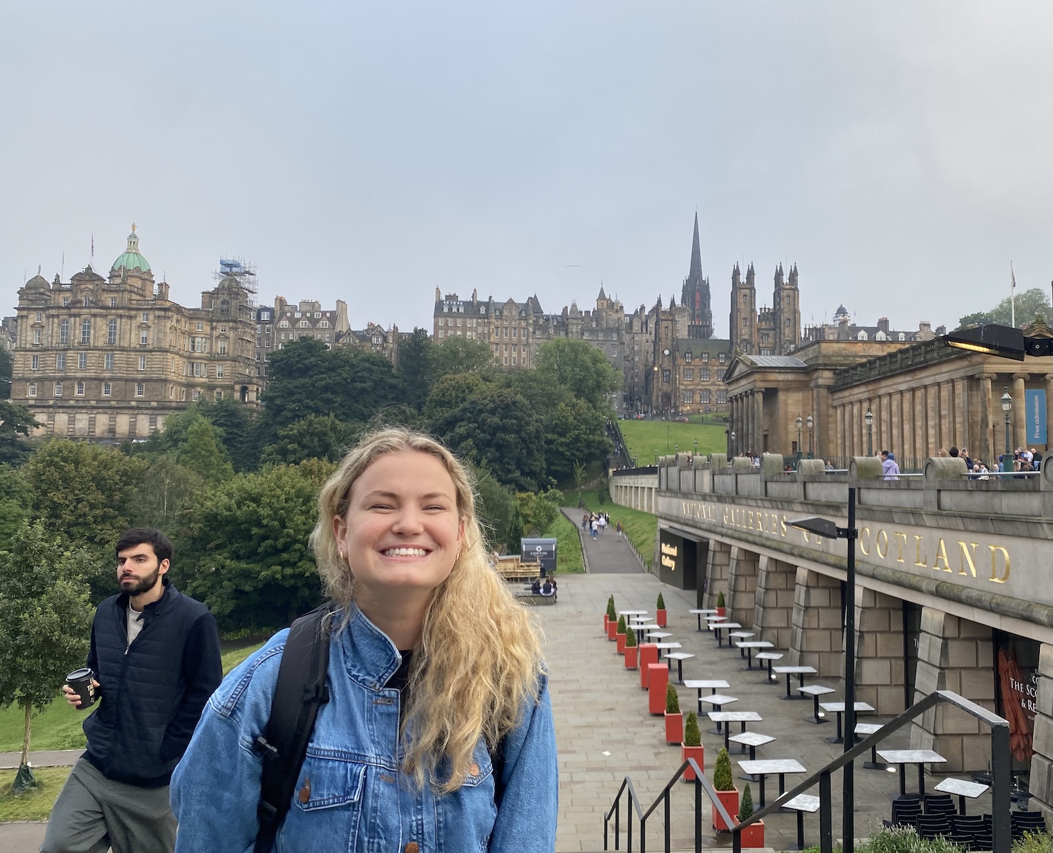 Picture of Emma with the city behind them