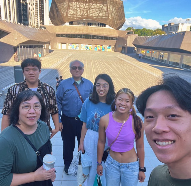 students posing in front of the Taipei Music Center
