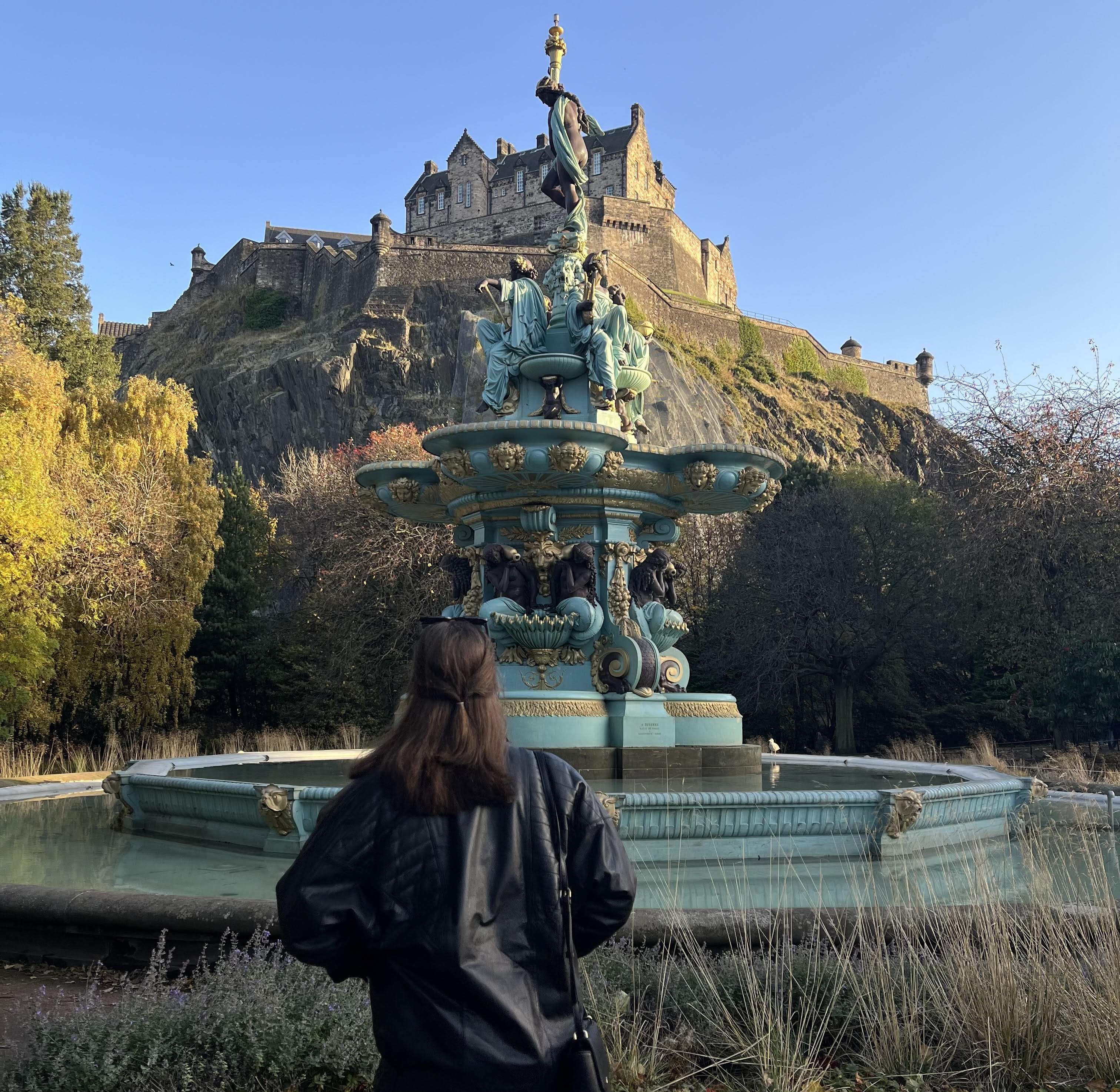 student standing in front of the water fountain at Edinburgh Castle is a historic castle in Edinburgh, Scotland.