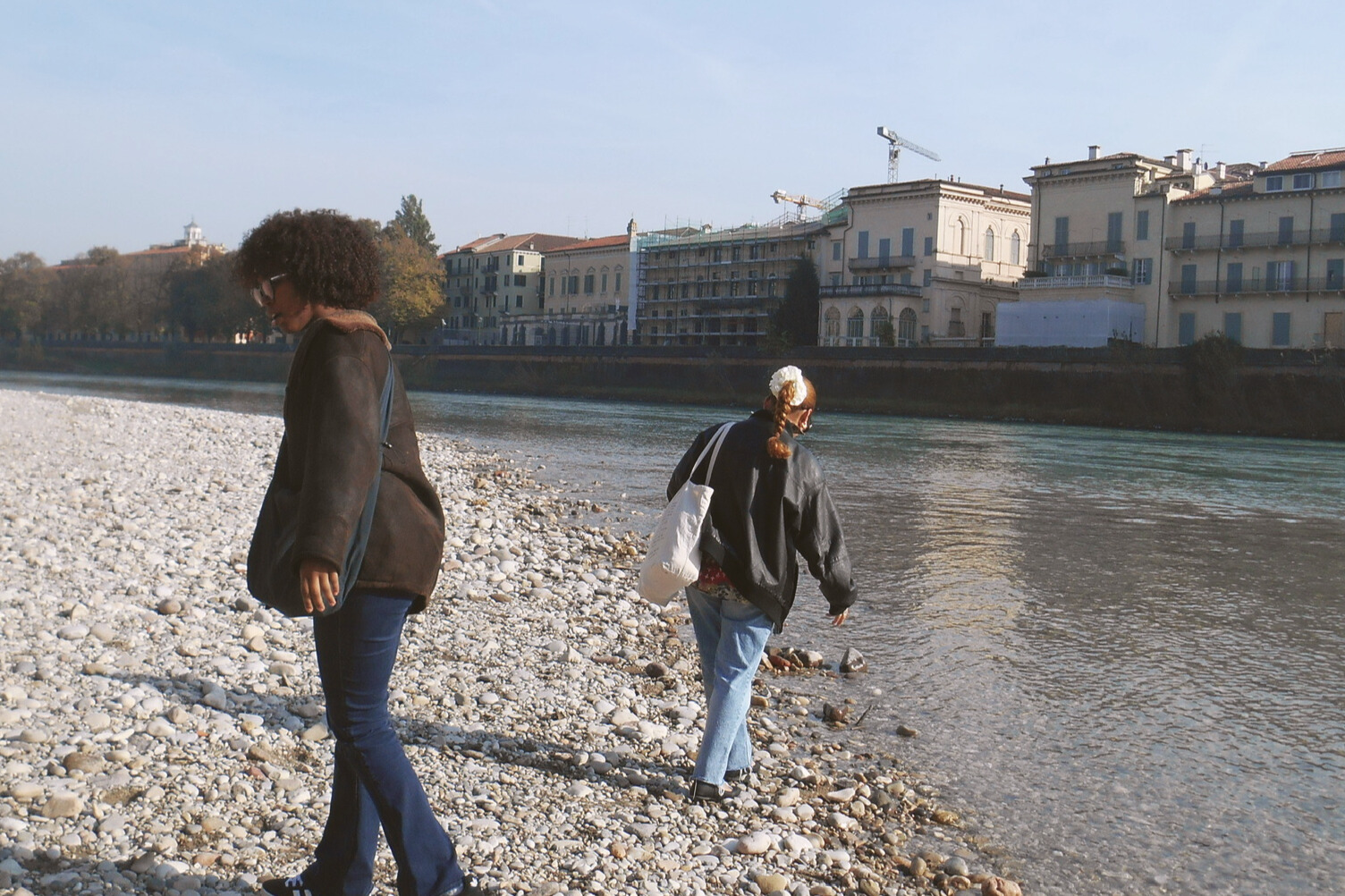 student exploring the canal in Verona, Italy