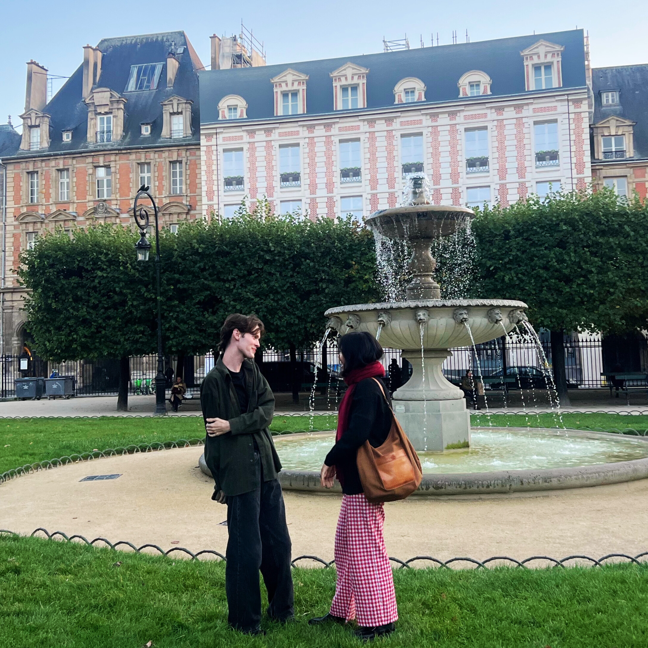 Picture of Jacob and friend at Place des vosges (Famous planned square in Paris, heart of Le Marais)