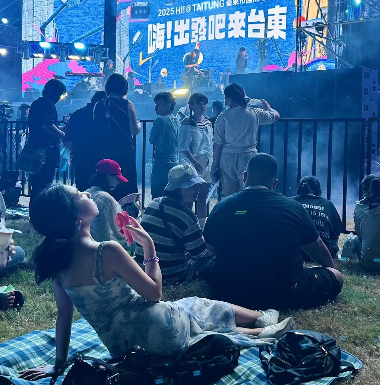 student attending a concert of their favorite Taiwanese band