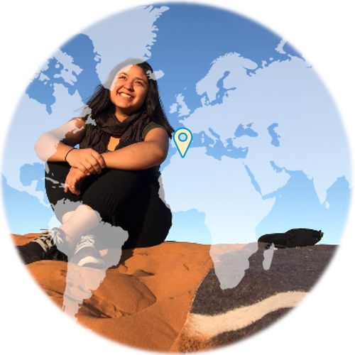Claudia Zurita, CCAS, in the dunes of Merzouga, Morocco during her semester at Al Akhawayn University - GW Exchange.