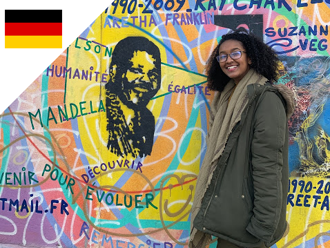 A GW student poses by a section of the Berlin Wall in Berlin, Germany.
