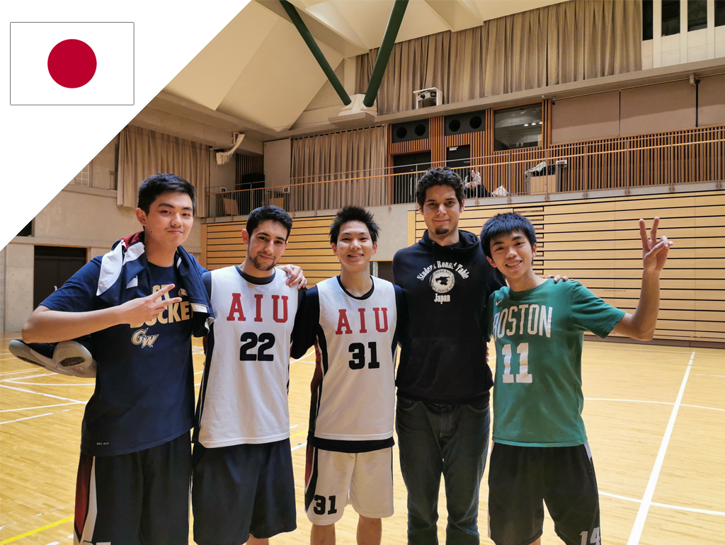 Five people in a gymnasium