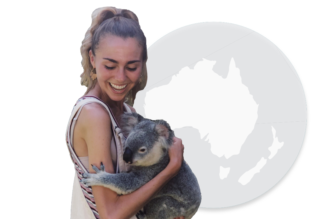 girl holding a koala bear