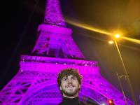 Stephen Shaw in front of the Eiffel Tower