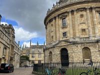 Streetscape in London with cobblestone streets and stone architecture