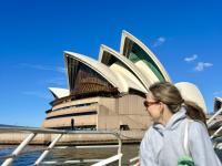student in front of Sydney Opera House
