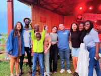 students with locals at an outing event