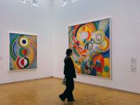 student walking through a museum in Paris, France