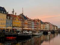 view of Denmark's Nyhavn Canal during sunset