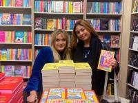 student at a book signing at the bookstore chain Foyles in the UK