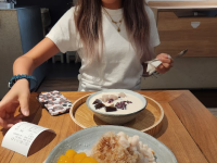student enjoying dessert with their language partner, Annie