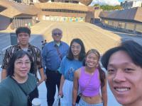students posing in front of the Taipei Music Center
