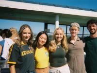 student posing with their friend group in Australia