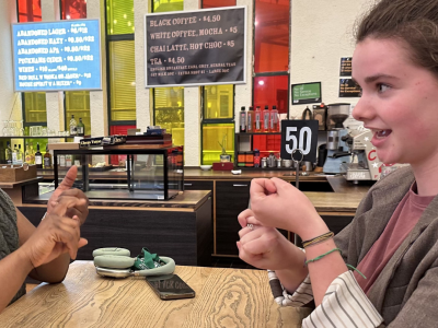Tessa practicing the New Zealand Sign Language