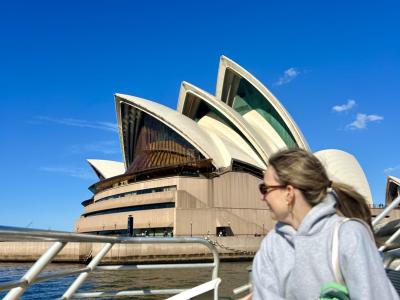student in front of Sydney Opera House