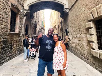 student showing her dad around