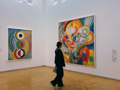 student walking through a museum in Paris, France