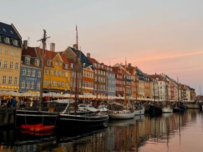view of Denmark's Nyhavn Canal during sunset