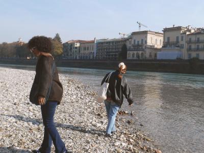 student exploring the canal in Verona, Italy