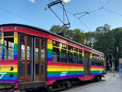 image of rainbow colored tram in Italy