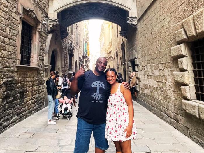student showing her dad around