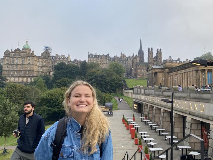 Picture of Emma with the city behind them