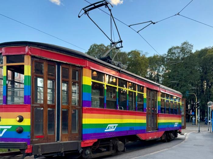 image of rainbow colored tram in Italy