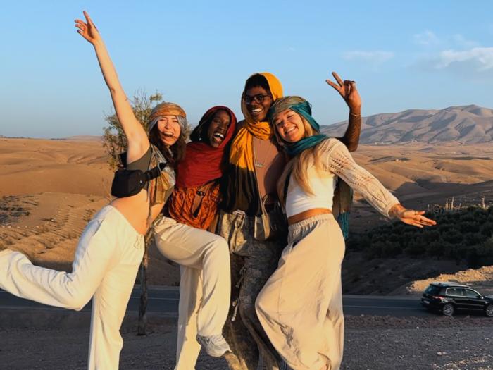 student with group of friends traveling