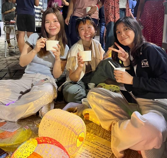 Hunter Hom friends and lanterns